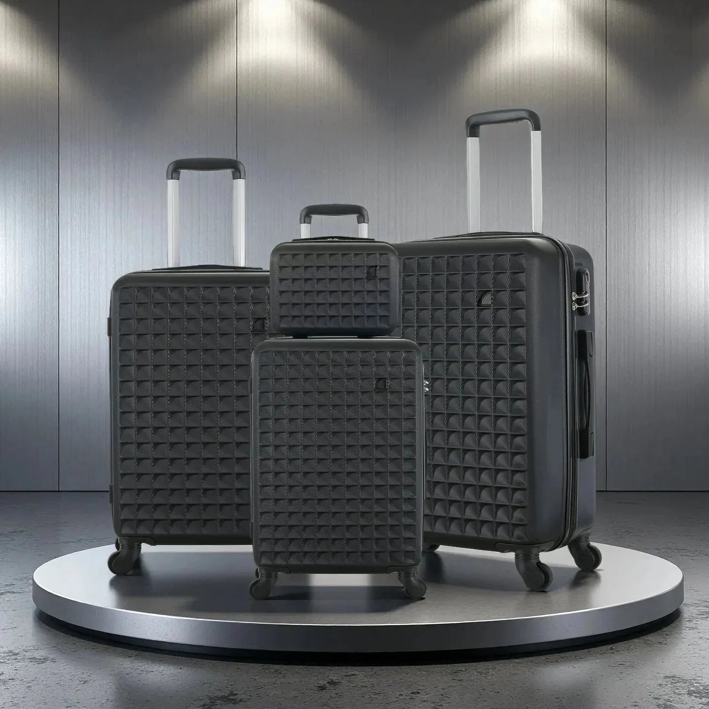 Four-piece Nova Mart ABS hardside luggage set with a matching cosmetic case, featuring sturdy design and multiple compartments.