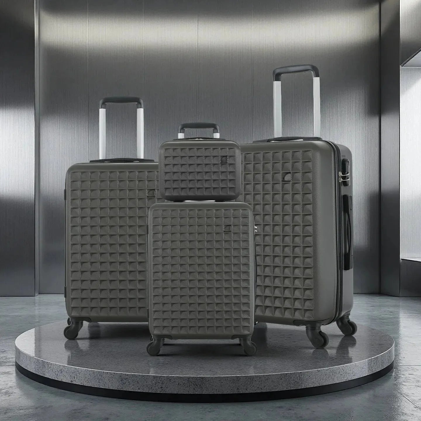Four-piece Nova Mart ABS hardside luggage set with a matching cosmetic case, featuring durable, sleek suitcases for travel.