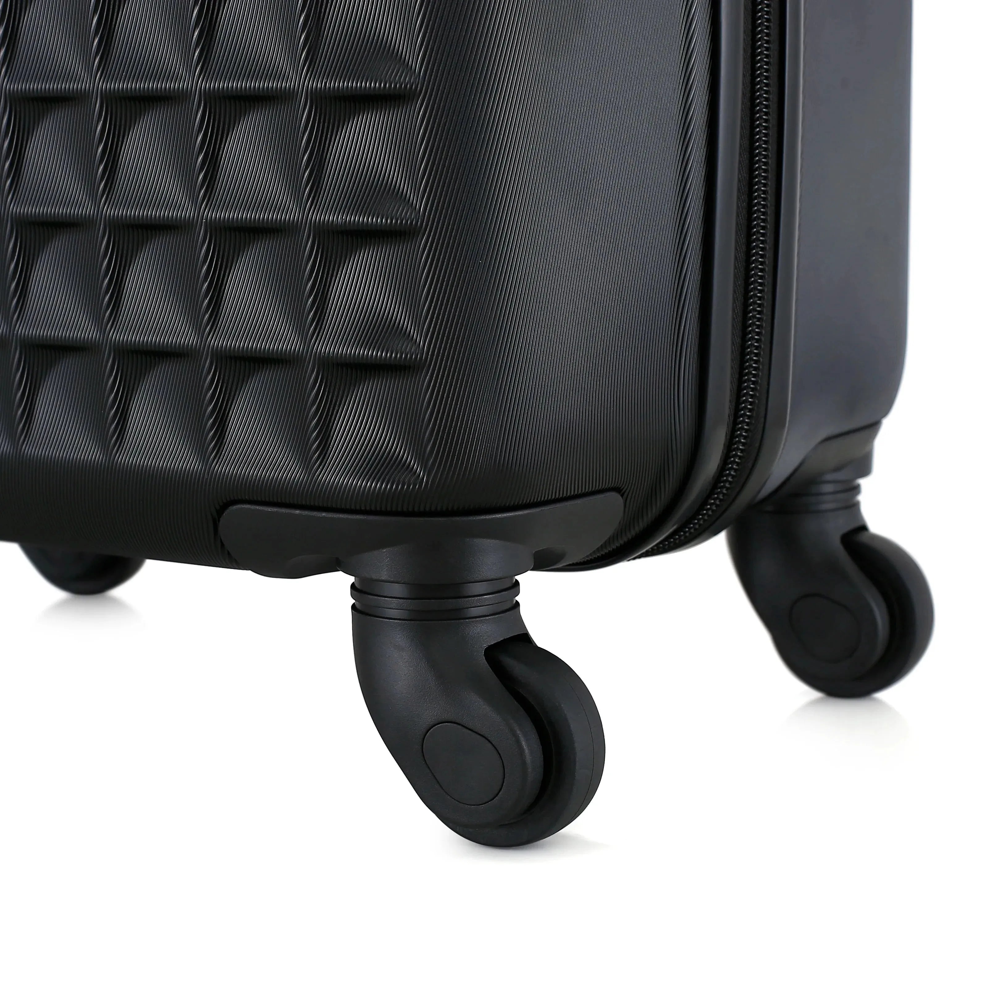 Four-piece Nova Mart ABS hardside luggage set with matching cosmetic case, featuring sleek design and sturdy wheels.