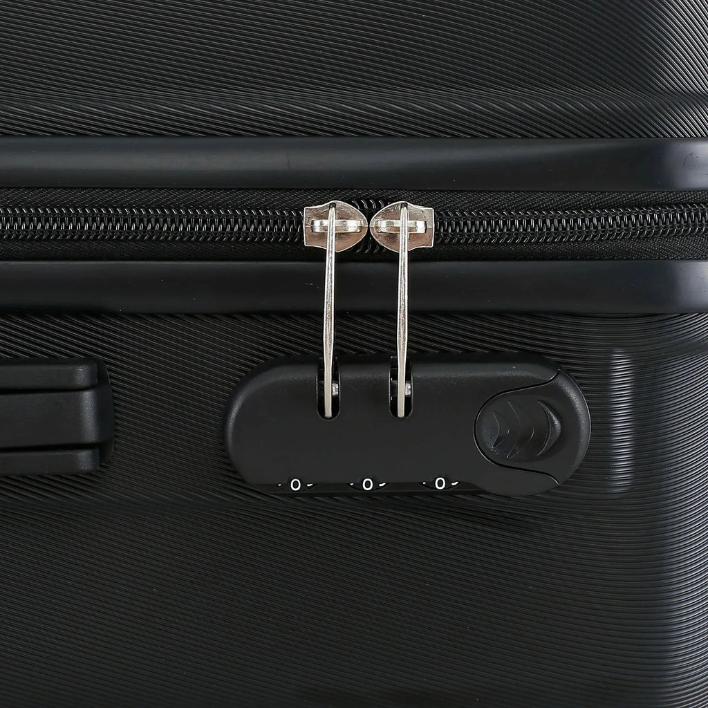 Four-piece Nova Mart ABS hardside luggage set with matching cosmetic case, durable travel suitcases in black.