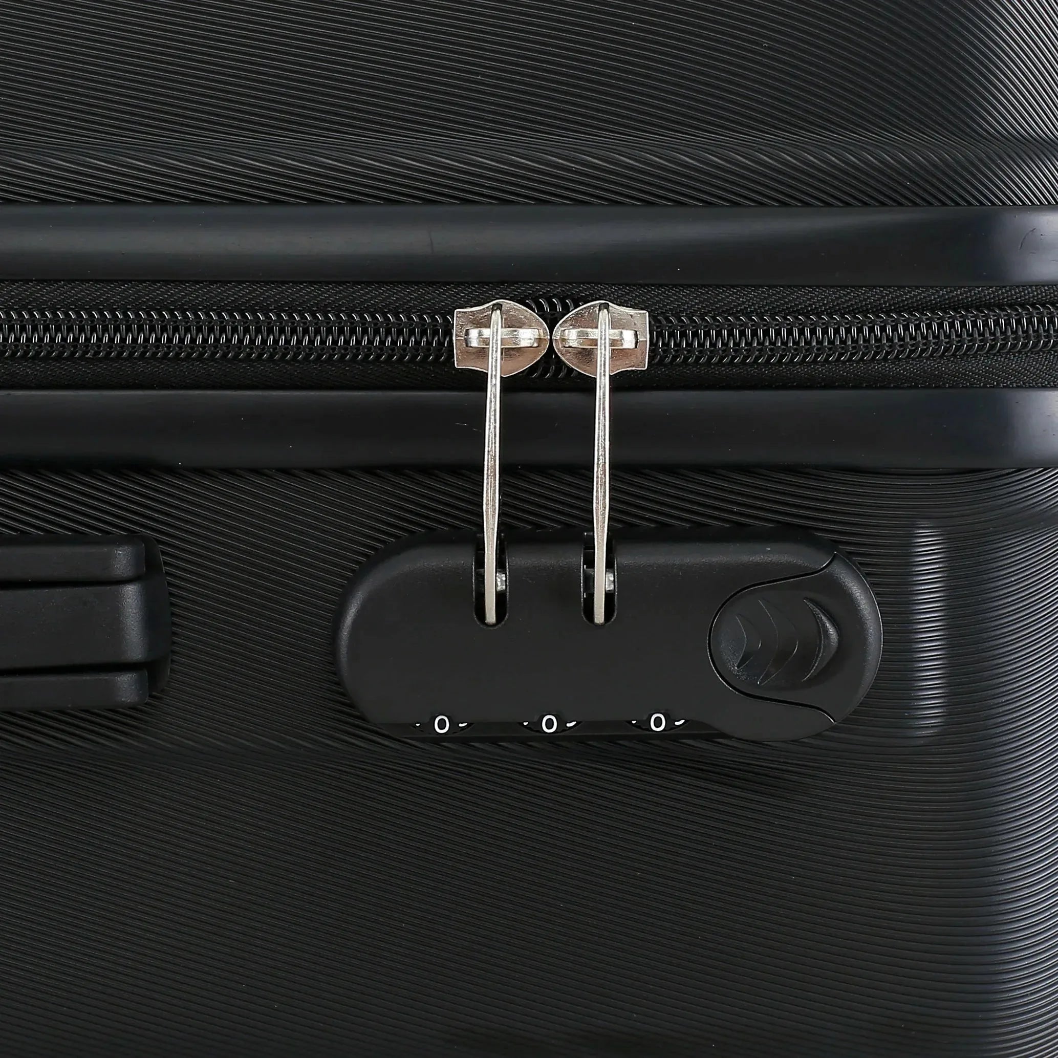 Four-piece Nova Mart ABS hardside luggage set with matching cosmetic case, durable travel suitcases in black.