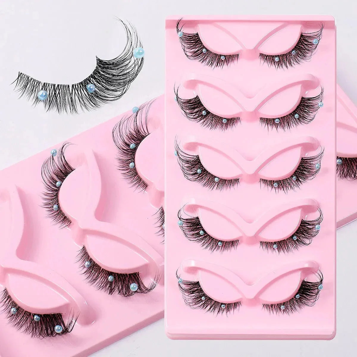 Five pairs of Nova Mart 3D Foxy Cat Eye Cluster Lashes, false eyelashes with voluminous, layered lash clusters for a dramatic look.