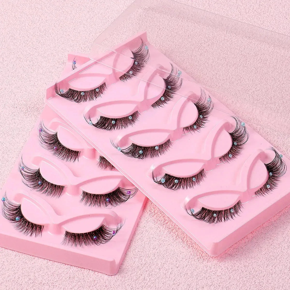 Five pairs of Nova Mart 3D Foxy Cat Eye Cluster Lashes false eyelashes for a dramatic, voluminous eye look in beauty and nail care.