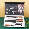 Six-piece Nova Mart steel kitchen knife set with black handles displayed in a gift case, suitable for kitchen and dining use.