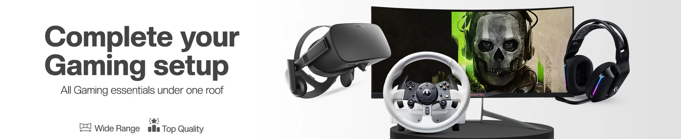 Desktop promotional banner for Nova Mart with burned-in text reading: Complete your Gaming setup, All Gaming essentials under one roof, Wide Range, Top Quality. Image features a curved ultra-wide gaming monitor displaying a character with a skull mask, a racing wheel controller, a VR headset, and a black gaming headset over a clean white background.
