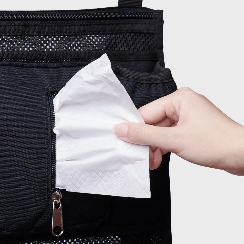 Nova Mart Sunveno baby stroller organizer bag with multiple storage compartments hanging on a stroller handle.