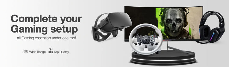 Mobile promotional banner for Nova Mart with burned-in text reading: Complete your Gaming setup, All Gaming essentials under one roof, Wide Range, Top Quality. Image features a curved ultra-wide gaming monitor displaying a character with a skull mask, a racing wheel controller, a VR headset, and a black gaming headset over a clean white background.