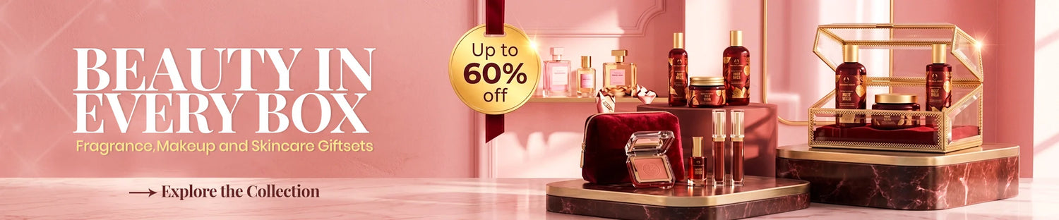 Luxury beauty gift box featuring premium perfume, skincare, and makeup on marble pedestals with 60% off offer.