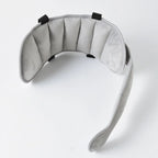 Adjustable baby car seat head support strap by Nova Mart, designed to keep baby's head comfortable and secure during car rides.