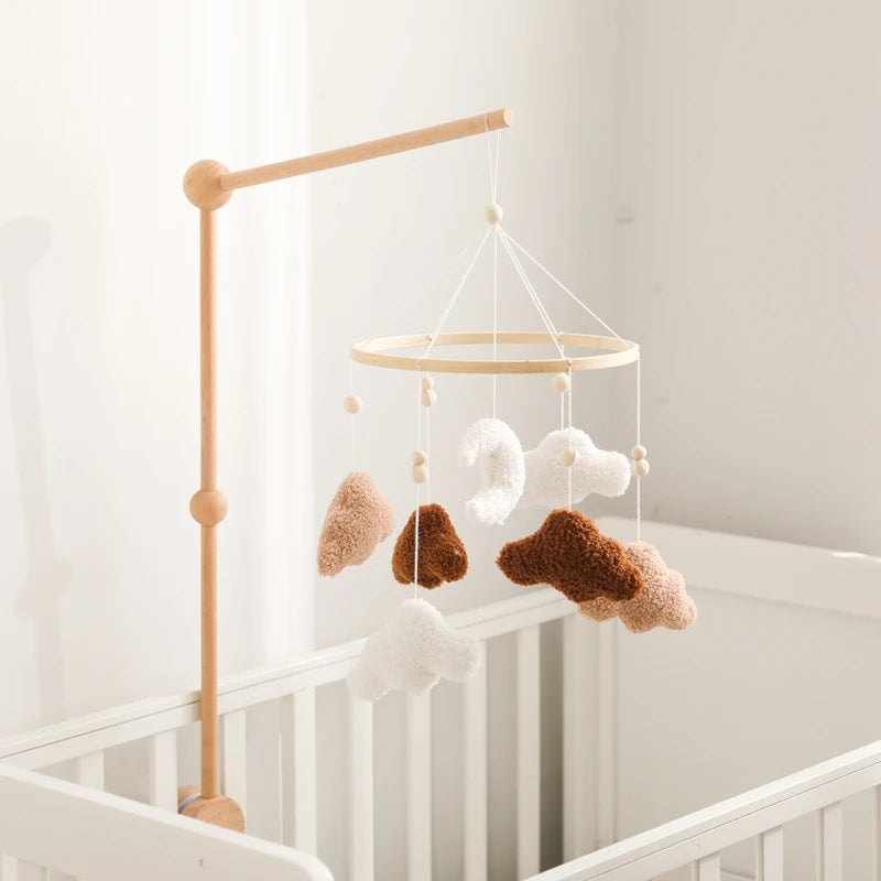 Wooden crochet star baby crib mobile with bell rattle toy, Nova Mart baby toy for soothing and entertainment.