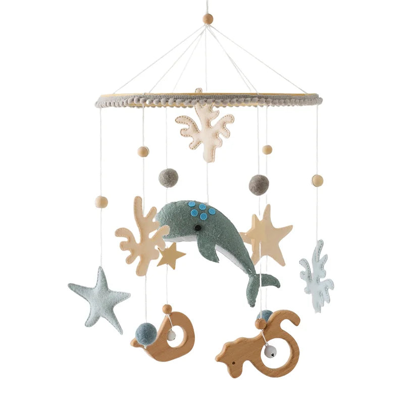 Wooden crochet stars baby crib mobile with bell rattle toy, featuring soft fabric stars and wooden beads for infant entertainment.