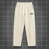 Men's solid color straight leg jogging pants by Nova Mart, casual sportswear, lightweight and comfortable for active wear.