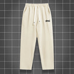 Men's solid color straight leg jogging pants by Nova Mart, casual sportswear, lightweight and comfortable for active wear.