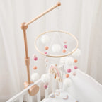 Wooden baby crib rattle toy with crochet bed bell bracket for infants 0-12 months, designed by Nova Mart Baby Toys.