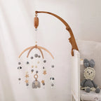 Nova Mart DIY baby crib bed bell holder arm with rotating music box, featuring colorful toy and adjustable attachment for infants.