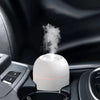 Close-up of a sleek, white 220ML USB humidifier with whisper-quiet operation, ideal for desktops or bedrooms.