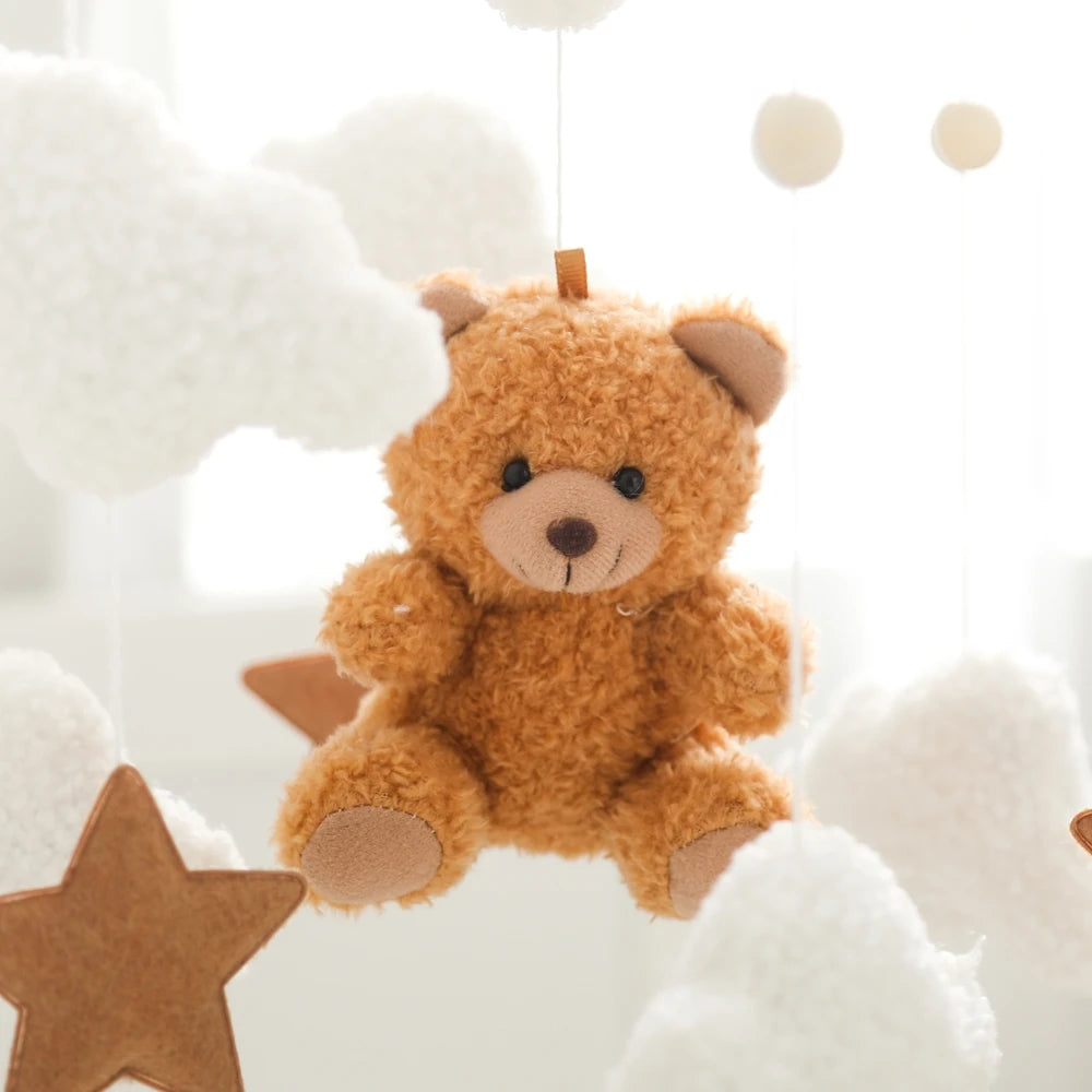 Wooden baby crib mobile featuring soft felt cartoon bear and music box from Nova Mart, ideal for soothing infants.