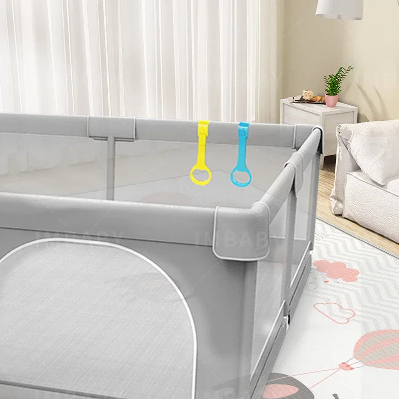 Light gray IMBABY baby playpen by Nova Mart with pull ring and ball box, designed for safe play and easy supervision.