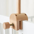Baby wooden crib mobile with cloud-shaped hanging rattle toy on a bracket, designed by Nova Mart for soothing nursery decor.