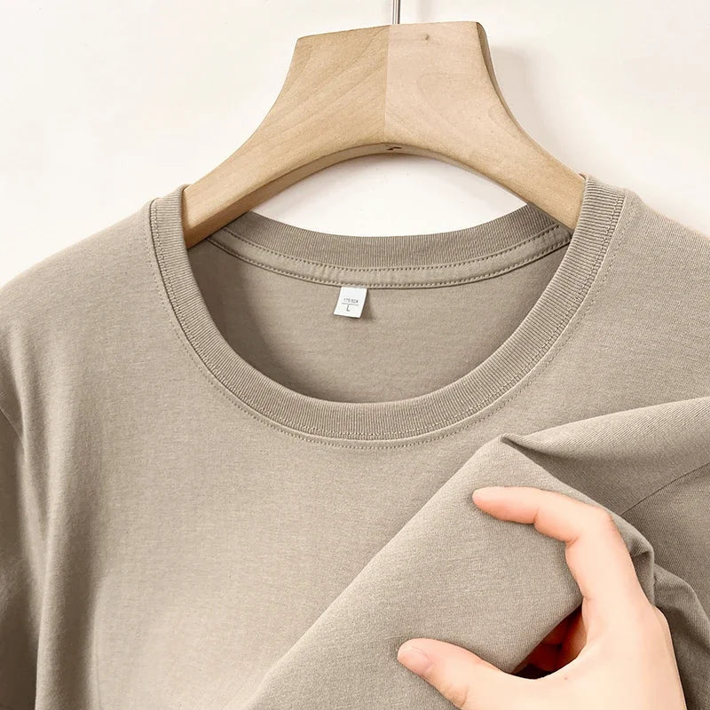 Men's Korean casual cotton round neck T-shirt by Nova Mart, shown in soft fabric with a classic fit and simple design.