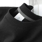 Unisex waffle knit T-shirt in solid color, casual men's fashion by Nova Mart, featuring a loose fit and comfortable fabric.