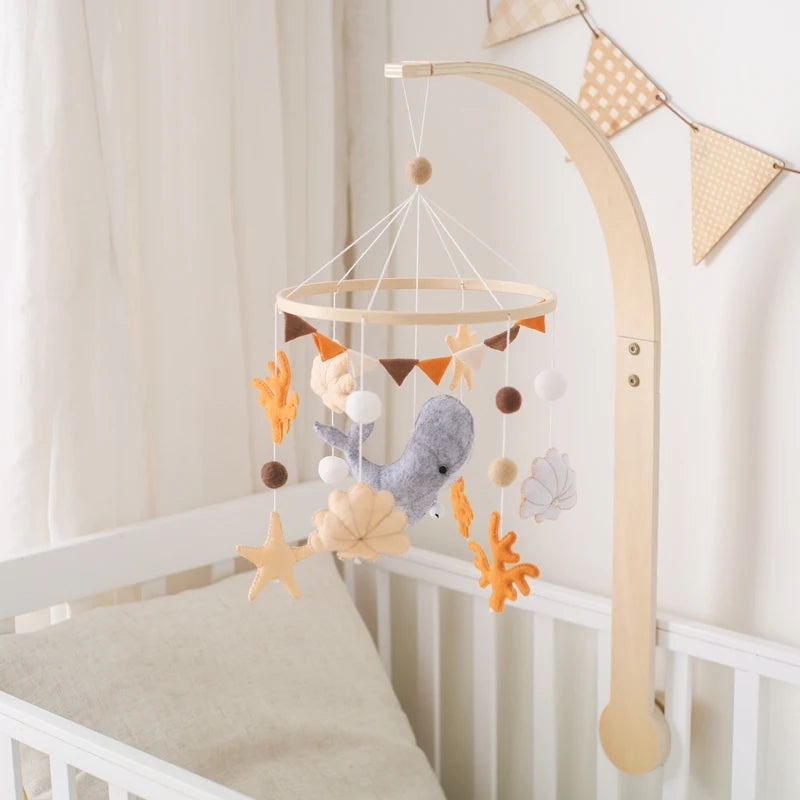 Wooden crochet stars baby crib mobile with bell rattle toy, designed for infants and perfect for nursery decor by Nova Mart
