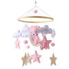 Wooden baby mobile and crib bell rattle toy from Nova Mart, featuring a music box design for newborns and infants up to 12 months