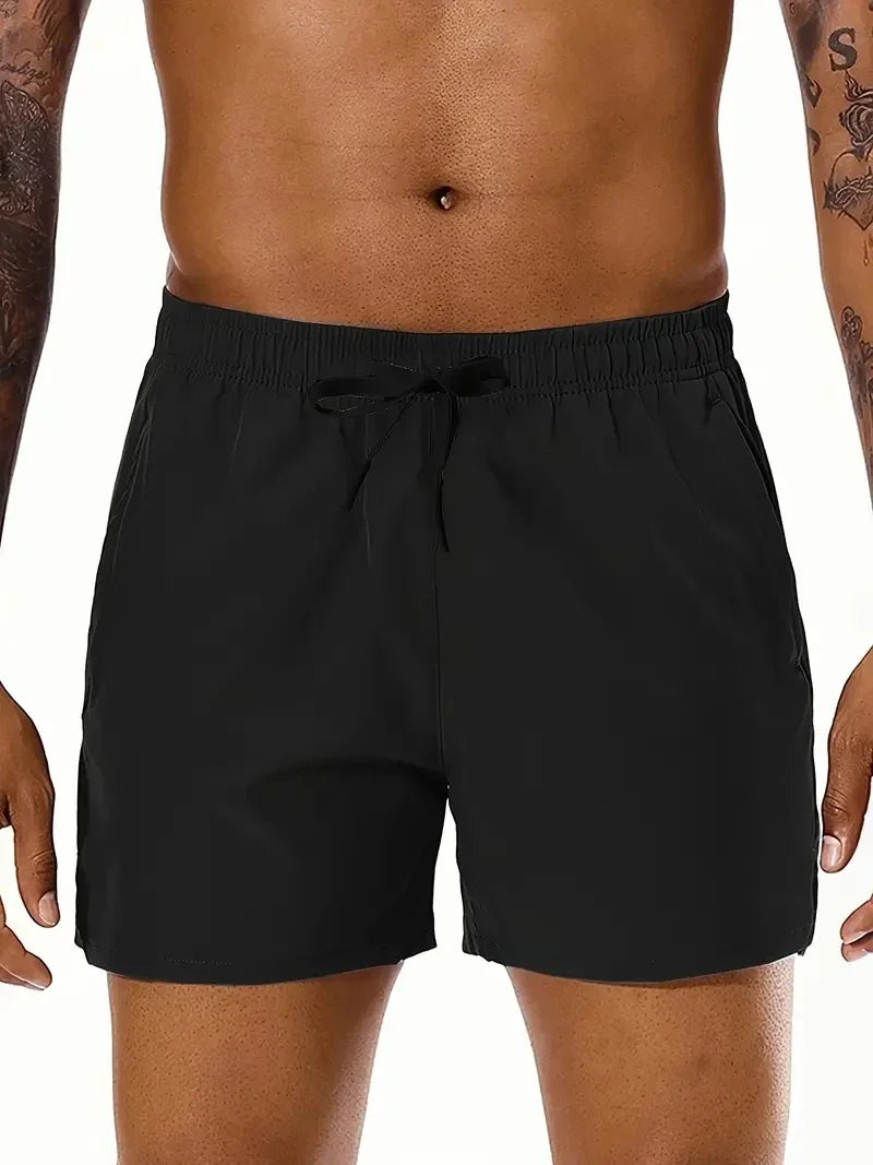 Men's beach sports shorts with elastic waist and double pockets, suitable for summer, by Nova Mart.