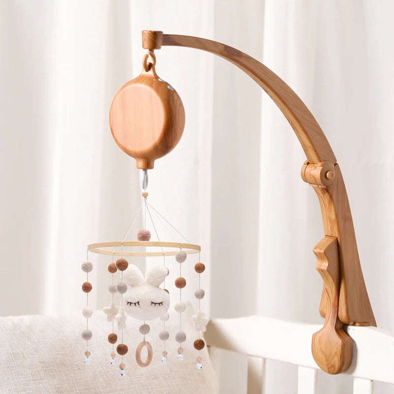 Nova Mart DIY baby crib bed bell holder arm with rotating music box, featuring colorful toy and secure attachment for infant crib.