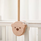 Baby wooden crib mobile with cloud-shaped hanging rattle toy and bracket, designed for infant cribs by Nova Mart.