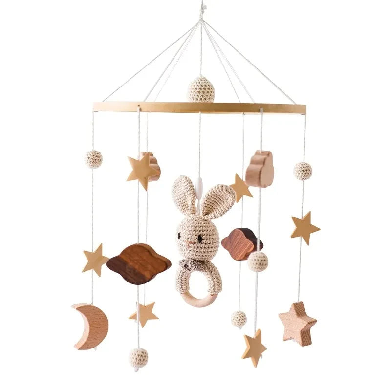 Wooden baby crib rattle toy with crochet bed bell bracket for infants 0-12 months, safe and soft baby toy by Nova Mart.