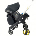 Nova Mart Doona & FooFoo stroller storage bag, 3-in-1 travel knapsack with multiple compartments and adjustable straps.