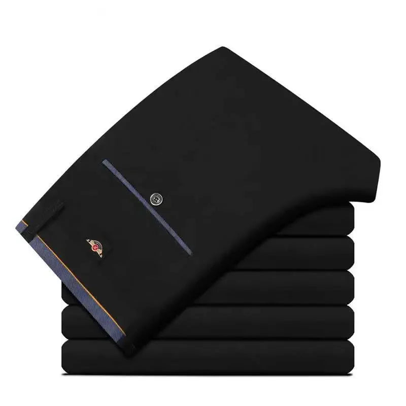Men's slim fit black suit pants by Nova Mart, formal trousers with a tailored fit and classic design, shown on a model.
