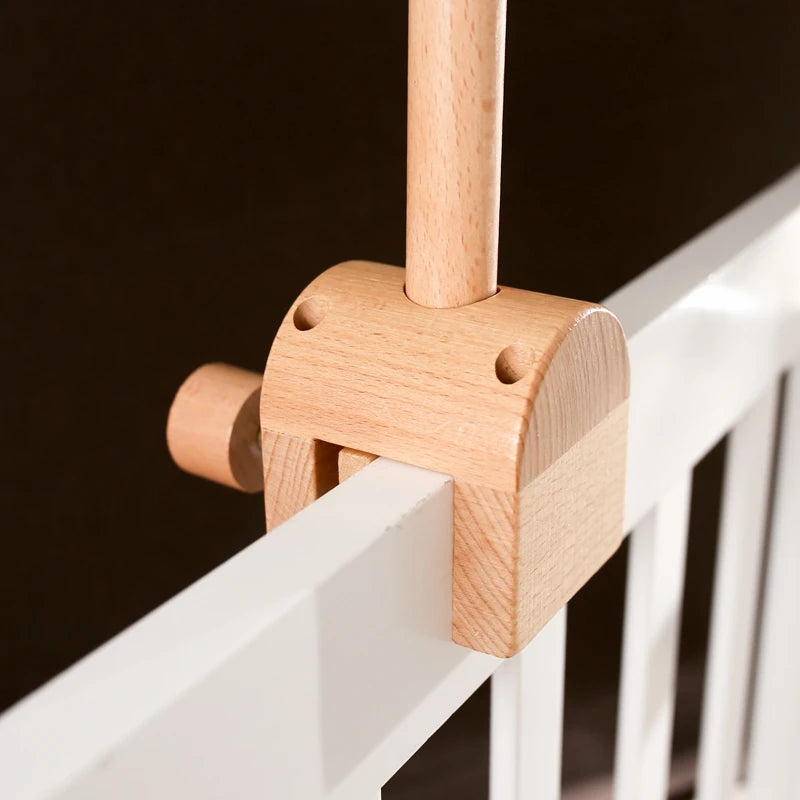 Baby wooden crib mobile with cloud-shaped hanging rattle toy and bracket, Nova Mart baby mobile for cribs.