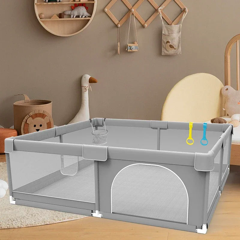 Light gray IMBABY Baby Playpen by Nova Mart with pull ring and ball box, designed for safe, secure play for infants.