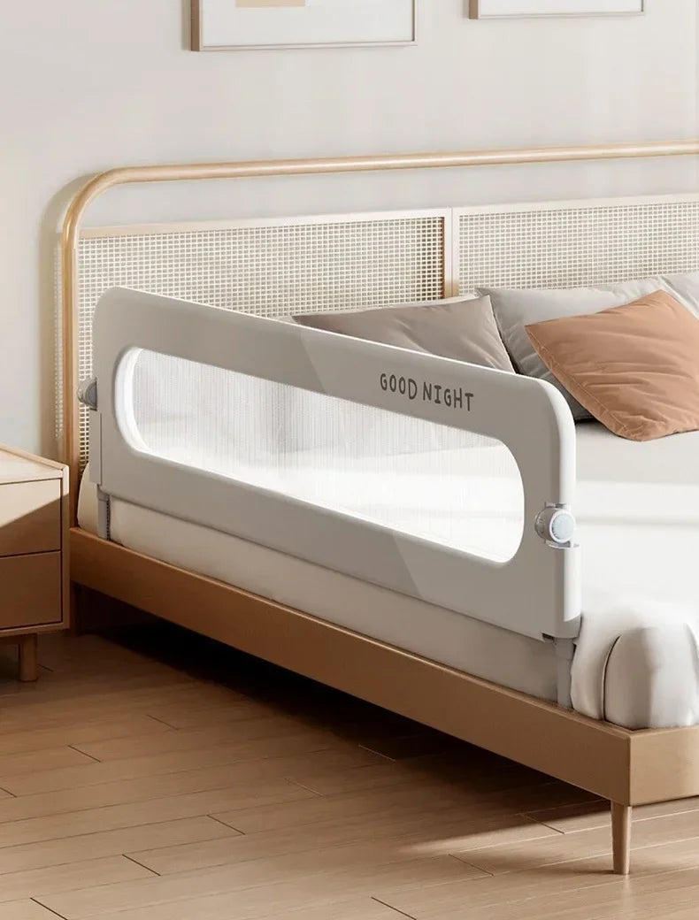 Adjustable IMBABY Baby Bed Rail Guard by Nova Mart, a safety barrier with mesh sides for preventing falls in baby cribs.