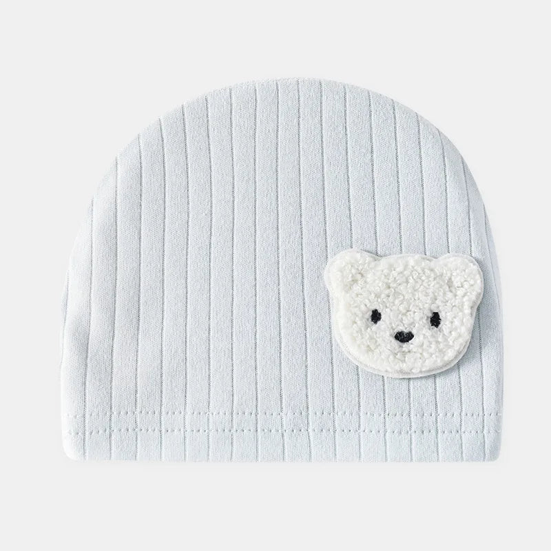 Cute newborn baby romper by Nova Mart in 100% cotton featuring a cartoon bear design and matching hat, perfect for cozy comfort.