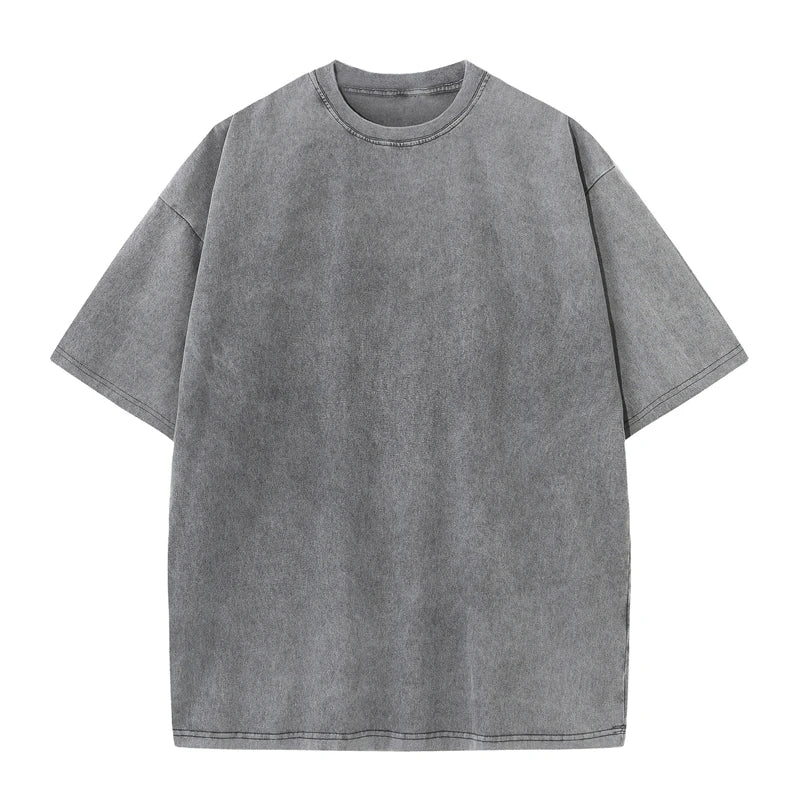 Men's oversized vintage washed cotton T-shirt by Nova Mart, showcasing a relaxed fit and streetwear style.