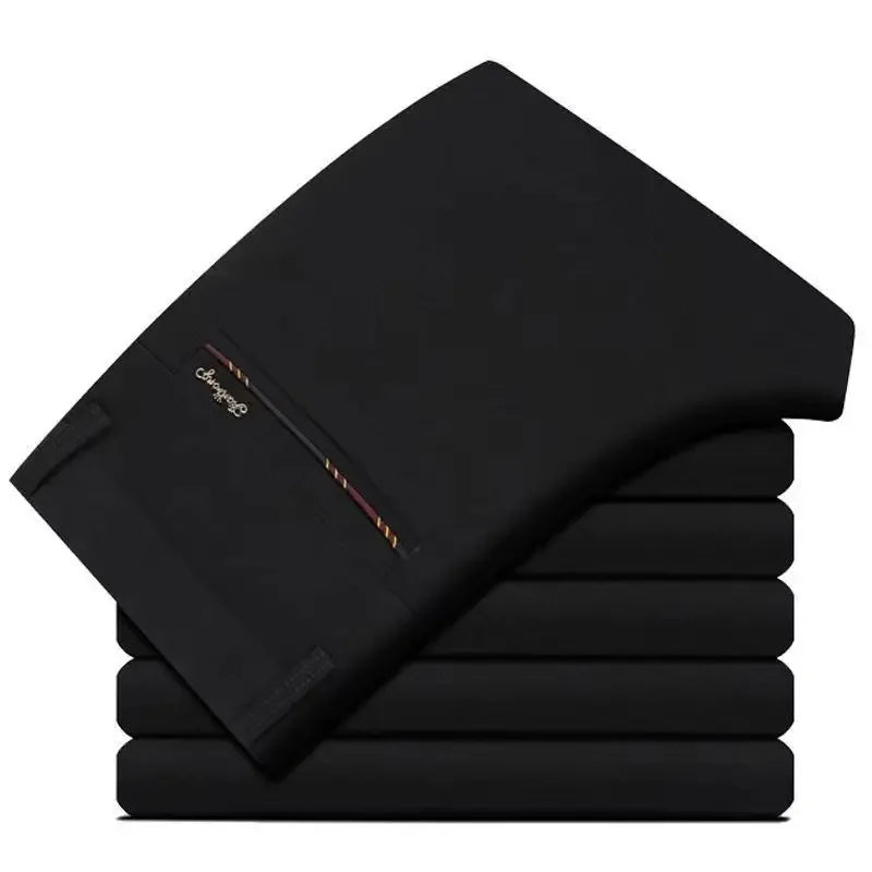 Men's slim fit black suit pants by Nova Mart, formal trousers with a tailored fit, shown on a hanger.