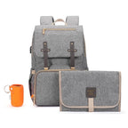 Nova Mart denim diaper bag backpack with thermal bottle pocket, stylish and functional baby diaper bag for parents.
