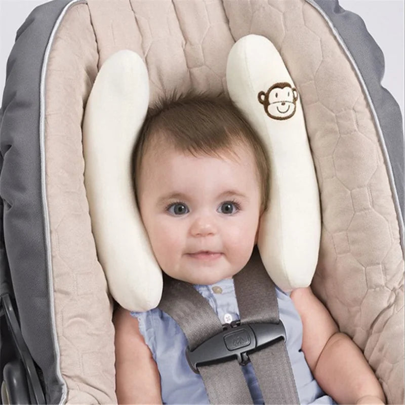 Nova Mart baby stroller neck pillow providing head support for car seats, soft and cushioned for infant comfort.