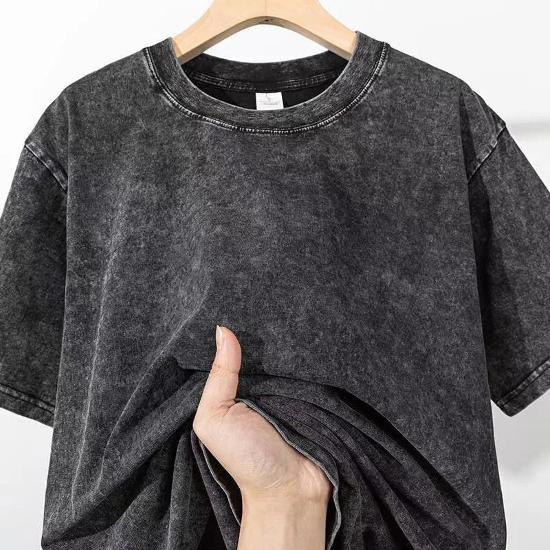 Men's oversized vintage washed cotton T-shirt by Nova Mart, casual streetwear style, front view showing relaxed fit and soft fabric