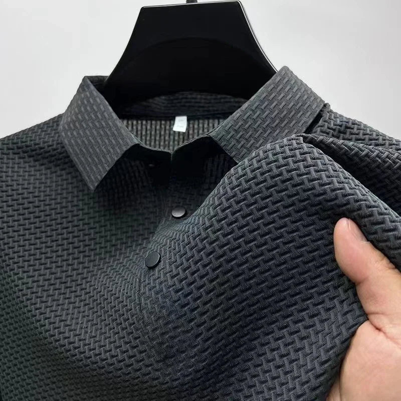 Men's navy blue polo shirt with bone flower pattern from Nova Mart, casual business style, shown on a mannequin.