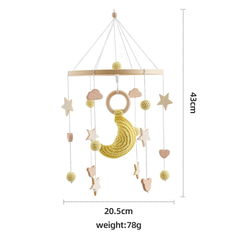 Wooden crochet stars baby crib mobile with bell and rattle toy by Nova Mart, designed for infants' nursery decor and entertainment.