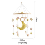 Wooden crochet stars baby crib mobile with bell and rattle toy by Nova Mart, designed for infants' nursery decor and entertainment.