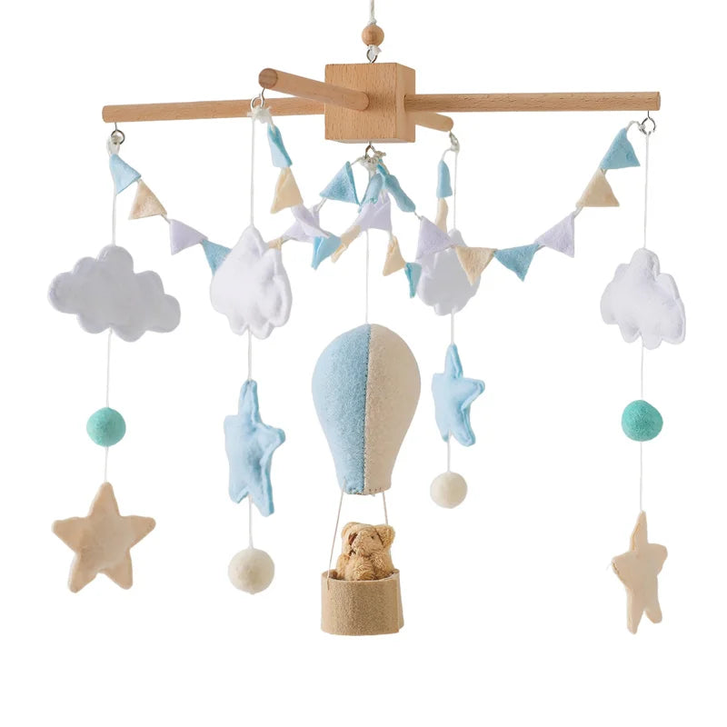 Wooden baby crib mobile by Nova Mart with animal felt dolls and music, designed as a charming baby toy for nursery decor.