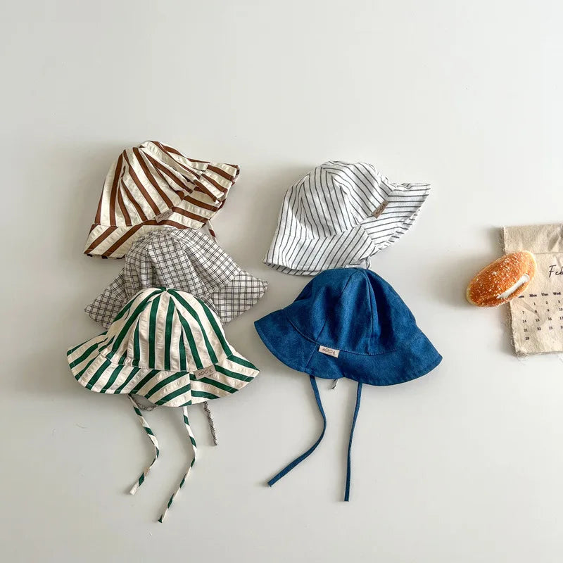 Baby bucket hat by Nova Mart, sunshade fisherman cap for infants and toddlers, lightweight and protective for sunny days.