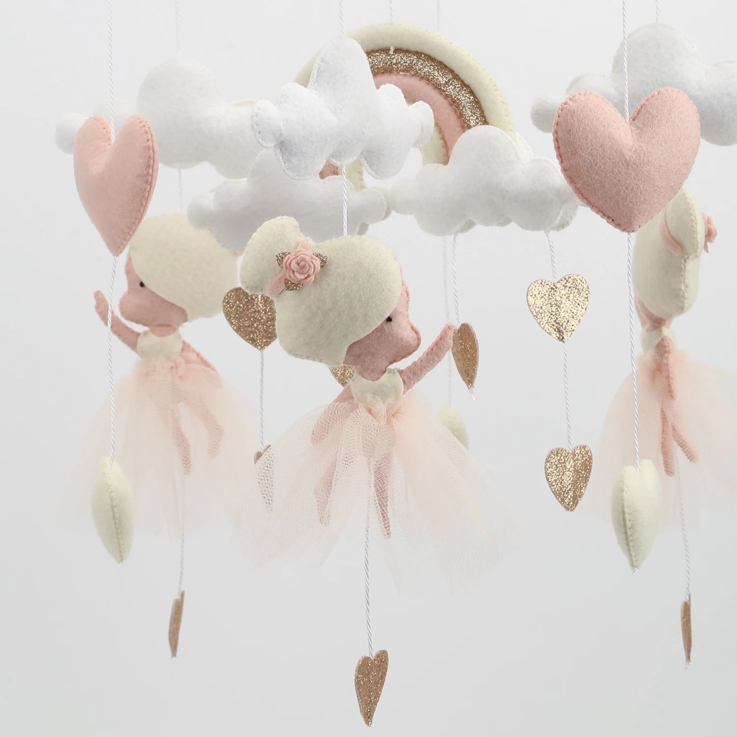 Nova Mart Ballerina Baby Crib Mobile with princess figures, designed for newborns, hanging above a baby crib in a nursery.