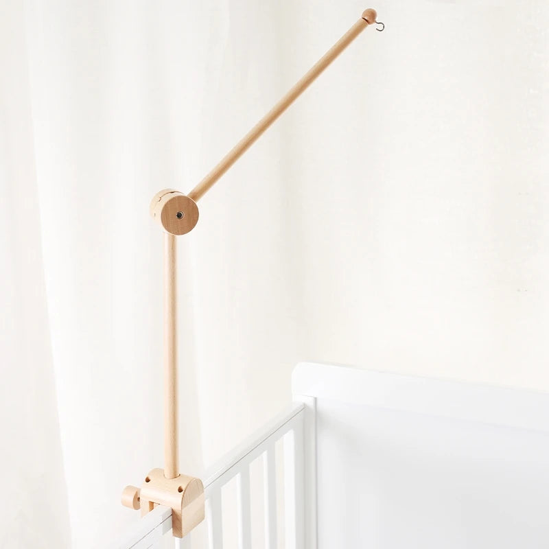 Baby wooden crib mobile with cloud-shaped hanging rattle toy on a bracket, designed for infants and nursery decor.