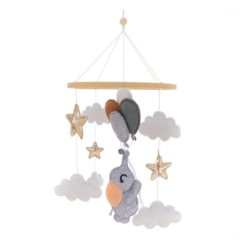 Wooden baby crib mobile by Nova Mart featuring a soft felt cartoon bear and music box for calming nursery decor.